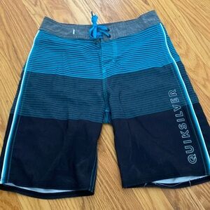 Boys quicksilver size 24 waist swim trunks.